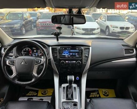 Білий Міцубісі Паджеро Спорт, об'ємом двигуна 2.44 л та пробігом 206 тис. км за 22000 $, фото 8 на Automoto.ua