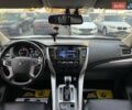 Білий Міцубісі Паджеро Спорт, об'ємом двигуна 2.44 л та пробігом 206 тис. км за 22000 $, фото 8 на Automoto.ua