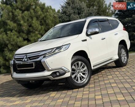 Білий Міцубісі Паджеро Спорт, об'ємом двигуна 2.44 л та пробігом 72 тис. км за 23900 $, фото 4 на Automoto.ua