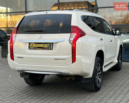 Білий Міцубісі Паджеро Спорт, об'ємом двигуна 2.44 л та пробігом 206 тис. км за 22000 $, фото 5 на Automoto.ua