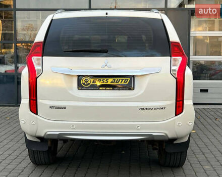 Білий Міцубісі Паджеро Спорт, об'ємом двигуна 2.44 л та пробігом 206 тис. км за 22000 $, фото 4 на Automoto.ua