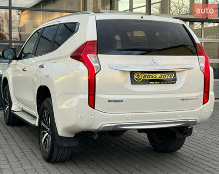 Білий Міцубісі Паджеро Спорт, об'ємом двигуна 2.44 л та пробігом 206 тис. км за 22000 $, фото 3 на Automoto.ua