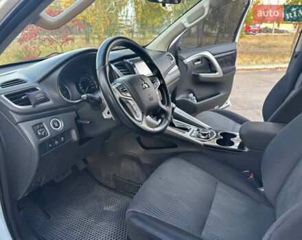 Білий Міцубісі Паджеро Спорт, об'ємом двигуна 2.44 л та пробігом 176 тис. км за 19900 $, фото 13 на Automoto.ua