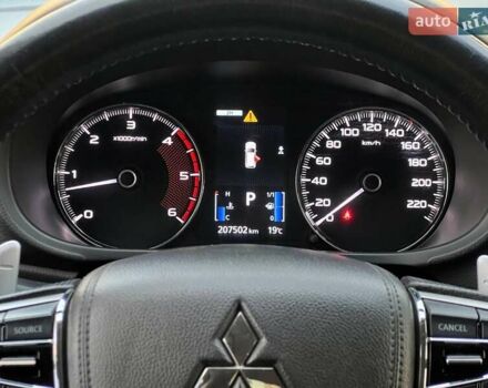 Білий Міцубісі Паджеро Спорт, об'ємом двигуна 2.44 л та пробігом 206 тис. км за 22000 $, фото 9 на Automoto.ua