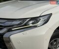 Білий Міцубісі Паджеро Спорт, об'ємом двигуна 2.44 л та пробігом 72 тис. км за 23900 $, фото 5 на Automoto.ua