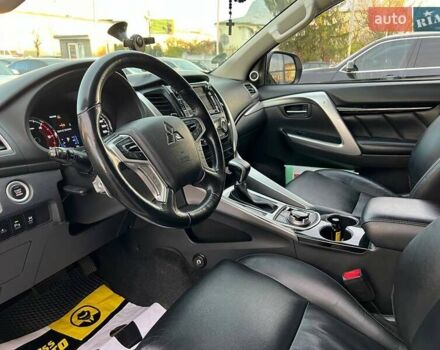 Білий Міцубісі Паджеро Спорт, об'ємом двигуна 2.44 л та пробігом 206 тис. км за 22000 $, фото 13 на Automoto.ua