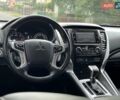 Білий Міцубісі Паджеро Спорт, об'ємом двигуна 2.44 л та пробігом 131 тис. км за 28700 $, фото 27 на Automoto.ua