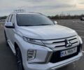 Белый Мицубиси Паджеро Спорт, объемом двигателя 2.44 л и пробегом 21 тыс. км за 32000 $, фото 1 на Automoto.ua