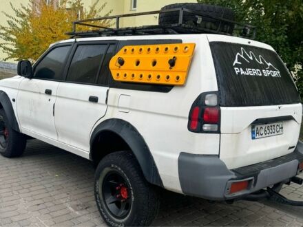 Белый Мицубиси Паджеро Спорт, объемом двигателя 2.5 л и пробегом 280 тыс. км за 5000 $, фото 1 на Automoto.ua