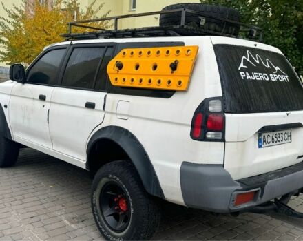 Білий Міцубісі Паджеро Спорт, об'ємом двигуна 2.5 л та пробігом 280 тис. км за 5000 $, фото 1 на Automoto.ua