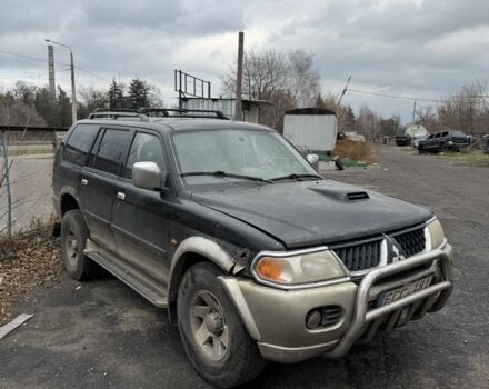Бежевый Мицубиси Паджеро Спорт, объемом двигателя 2.8 л и пробегом 200 тыс. км за 2472 $, фото 1 на Automoto.ua
