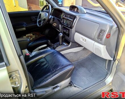 Бежевый Мицубиси Паджеро Спорт, объемом двигателя 3 л и пробегом 237 тыс. км за 8800 $, фото 5 на Automoto.ua