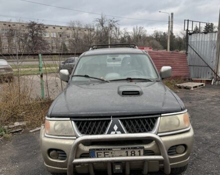 Бежевый Мицубиси Паджеро Спорт, объемом двигателя 2.8 л и пробегом 200 тыс. км за 2472 $, фото 2 на Automoto.ua