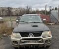 Бежевый Мицубиси Паджеро Спорт, объемом двигателя 2.8 л и пробегом 200 тыс. км за 2472 $, фото 2 на Automoto.ua
