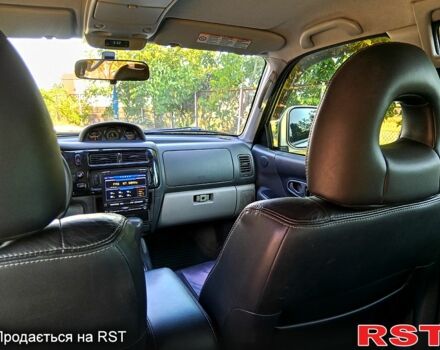 Бежевый Мицубиси Паджеро Спорт, объемом двигателя 3 л и пробегом 237 тыс. км за 8800 $, фото 4 на Automoto.ua