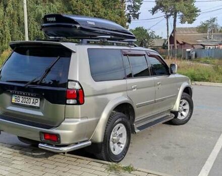 Бежевий Міцубісі Паджеро Спорт, об'ємом двигуна 3 л та пробігом 181 тис. км за 9400 $, фото 7 на Automoto.ua
