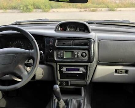 Бежевий Міцубісі Паджеро Спорт, об'ємом двигуна 3 л та пробігом 181 тис. км за 9400 $, фото 53 на Automoto.ua