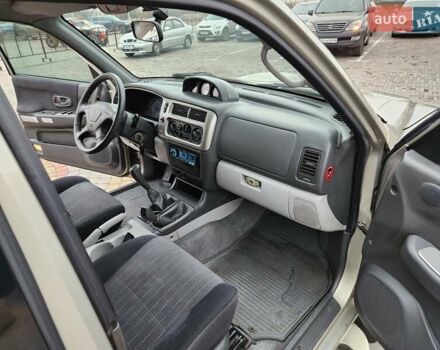 Бежевий Міцубісі Паджеро Спорт, об'ємом двигуна 2.5 л та пробігом 143 тис. км за 10800 $, фото 9 на Automoto.ua