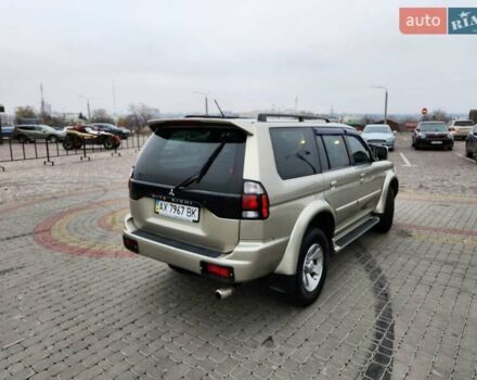 Бежевий Міцубісі Паджеро Спорт, об'ємом двигуна 2.5 л та пробігом 143 тис. км за 10800 $, фото 1 на Automoto.ua