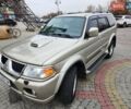 Бежевий Міцубісі Паджеро Спорт, об'ємом двигуна 2.5 л та пробігом 143 тис. км за 10800 $, фото 1 на Automoto.ua
