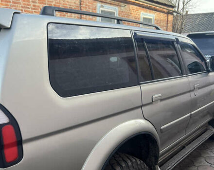 Бежевий Міцубісі Паджеро Спорт, об'ємом двигуна 3 л та пробігом 270 тис. км за 8300 $, фото 6 на Automoto.ua