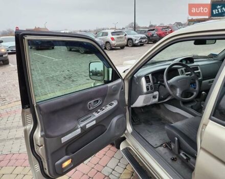 Бежевий Міцубісі Паджеро Спорт, об'ємом двигуна 2.5 л та пробігом 143 тис. км за 10800 $, фото 7 на Automoto.ua