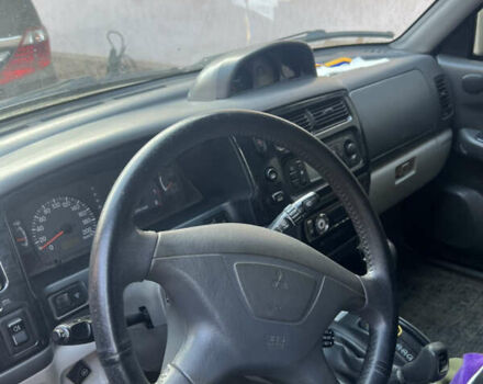 Бежевий Міцубісі Паджеро Спорт, об'ємом двигуна 3 л та пробігом 270 тис. км за 8300 $, фото 10 на Automoto.ua