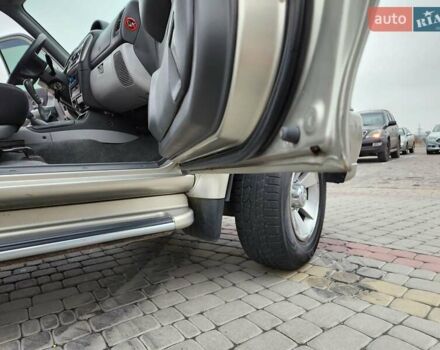 Бежевий Міцубісі Паджеро Спорт, об'ємом двигуна 2.5 л та пробігом 143 тис. км за 10800 $, фото 18 на Automoto.ua