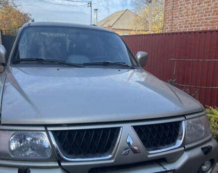 Бежевий Міцубісі Паджеро Спорт, об'ємом двигуна 3 л та пробігом 270 тис. км за 8300 $, фото 1 на Automoto.ua