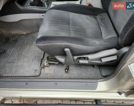 Бежевий Міцубісі Паджеро Спорт, об'ємом двигуна 2.5 л та пробігом 143 тис. км за 10800 $, фото 5 на Automoto.ua