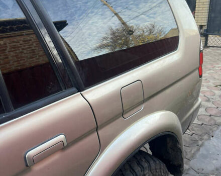 Бежевий Міцубісі Паджеро Спорт, об'ємом двигуна 3 л та пробігом 270 тис. км за 8300 $, фото 4 на Automoto.ua