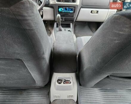 Бежевий Міцубісі Паджеро Спорт, об'ємом двигуна 2.5 л та пробігом 143 тис. км за 10800 $, фото 16 на Automoto.ua