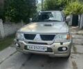 Бежевий Міцубісі Паджеро Спорт, об'ємом двигуна 2.5 л та пробігом 180 тис. км за 13000 $, фото 1 на Automoto.ua