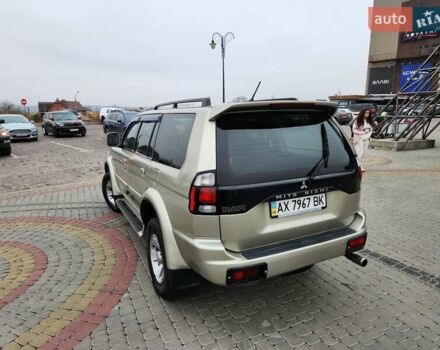 Бежевий Міцубісі Паджеро Спорт, об'ємом двигуна 2.5 л та пробігом 143 тис. км за 10800 $, фото 2 на Automoto.ua