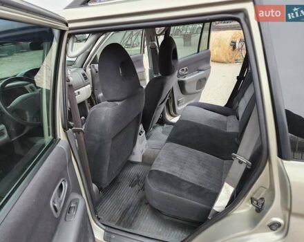 Бежевий Міцубісі Паджеро Спорт, об'ємом двигуна 2.5 л та пробігом 143 тис. км за 10800 $, фото 13 на Automoto.ua