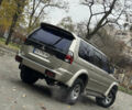 Бежевый Мицубиси Паджеро Спорт, объемом двигателя 3 л и пробегом 220 тыс. км за 8800 $, фото 4 на Automoto.ua