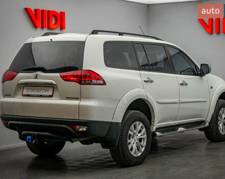 Бежевий Міцубісі Паджеро Спорт, об'ємом двигуна 2.5 л та пробігом 170 тис. км за 17331 $, фото 1 на Automoto.ua