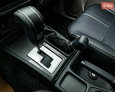 Бежевий Міцубісі Паджеро Спорт, об'ємом двигуна 2.5 л та пробігом 170 тис. км за 17331 $, фото 17 на Automoto.ua