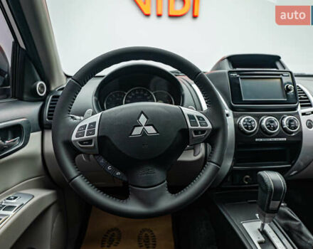 Бежевий Міцубісі Паджеро Спорт, об'ємом двигуна 2.5 л та пробігом 170 тис. км за 17331 $, фото 11 на Automoto.ua