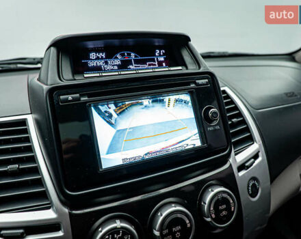 Бежевий Міцубісі Паджеро Спорт, об'ємом двигуна 2.5 л та пробігом 170 тис. км за 17331 $, фото 16 на Automoto.ua