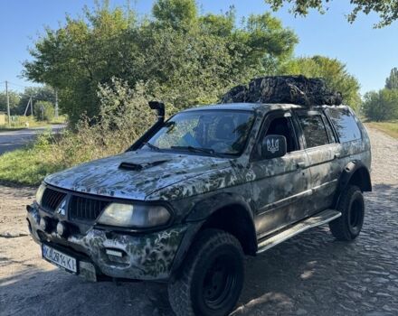 Бежевый Мицубиси Паджеро Спорт, объемом двигателя 2.5 л и пробегом 400 тыс. км за 4000 $, фото 1 на Automoto.ua
