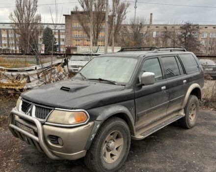 Бежевый Мицубиси Паджеро Спорт, объемом двигателя 2.8 л и пробегом 200 тыс. км за 2472 $, фото 1 на Automoto.ua