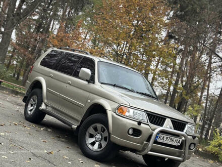 Бежевий Міцубісі Паджеро Спорт, об'ємом двигуна 3 л та пробігом 220 тис. км за 8800 $, фото 1 на Automoto.ua