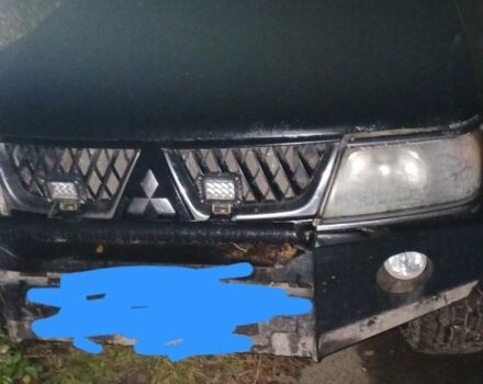 Чорний Міцубісі Паджеро Спорт, об'ємом двигуна 3 л та пробігом 300 тис. км за 3000 $, фото 1 на Automoto.ua