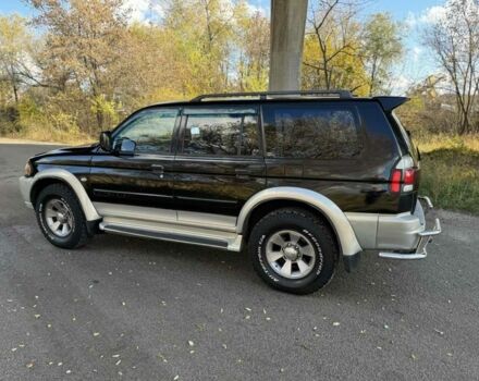 Черный Мицубиси Паджеро Спорт, объемом двигателя 3 л и пробегом 293 тыс. км за 4599 $, фото 1 на Automoto.ua