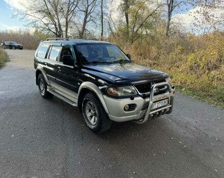 Черный Мицубиси Паджеро Спорт, объемом двигателя 3 л и пробегом 293 тыс. км за 4599 $, фото 6 на Automoto.ua