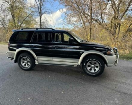 Черный Мицубиси Паджеро Спорт, объемом двигателя 3 л и пробегом 293 тыс. км за 4599 $, фото 5 на Automoto.ua