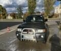 Черный Мицубиси Паджеро Спорт, объемом двигателя 3 л и пробегом 400 тыс. км за 6500 $, фото 1 на Automoto.ua