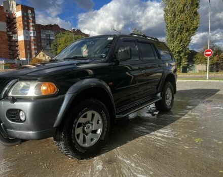 Черный Мицубиси Паджеро Спорт, объемом двигателя 3 л и пробегом 400 тыс. км за 6500 $, фото 2 на Automoto.ua