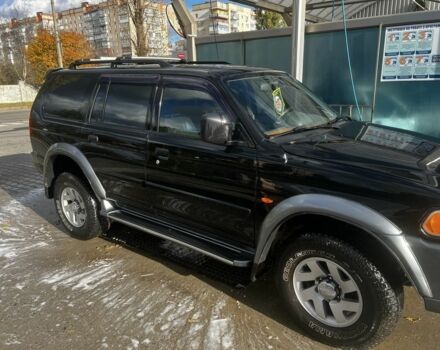 Черный Мицубиси Паджеро Спорт, объемом двигателя 3 л и пробегом 400 тыс. км за 6500 $, фото 5 на Automoto.ua